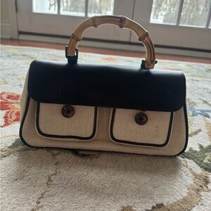 LOFT Elegant Black and Cream Handbag with Bamboo Handle